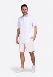 4. Model wearing classic cotton polo shirt by East Vibe